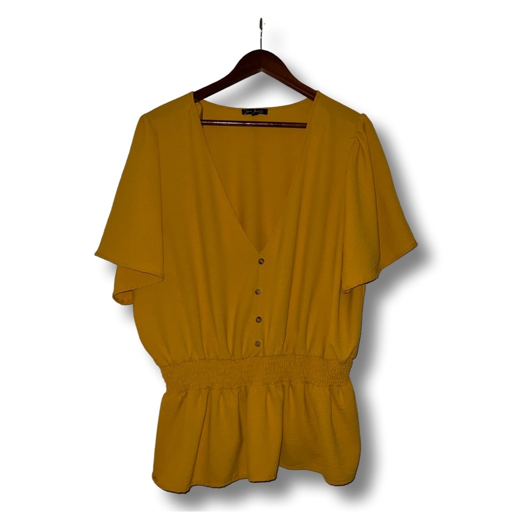 Yellow peplum top